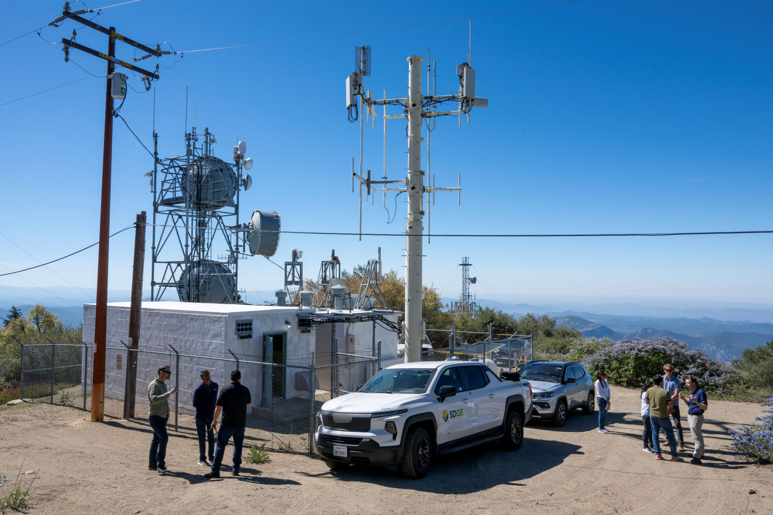 Smartphones and radio-testing equipment on an editorial desk